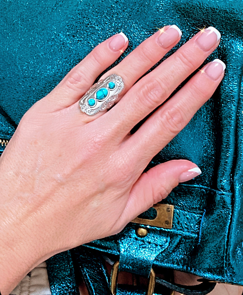 Silver and turquoise ring and CANYON